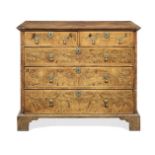 A Queen Anne walnut and featherbanded chest