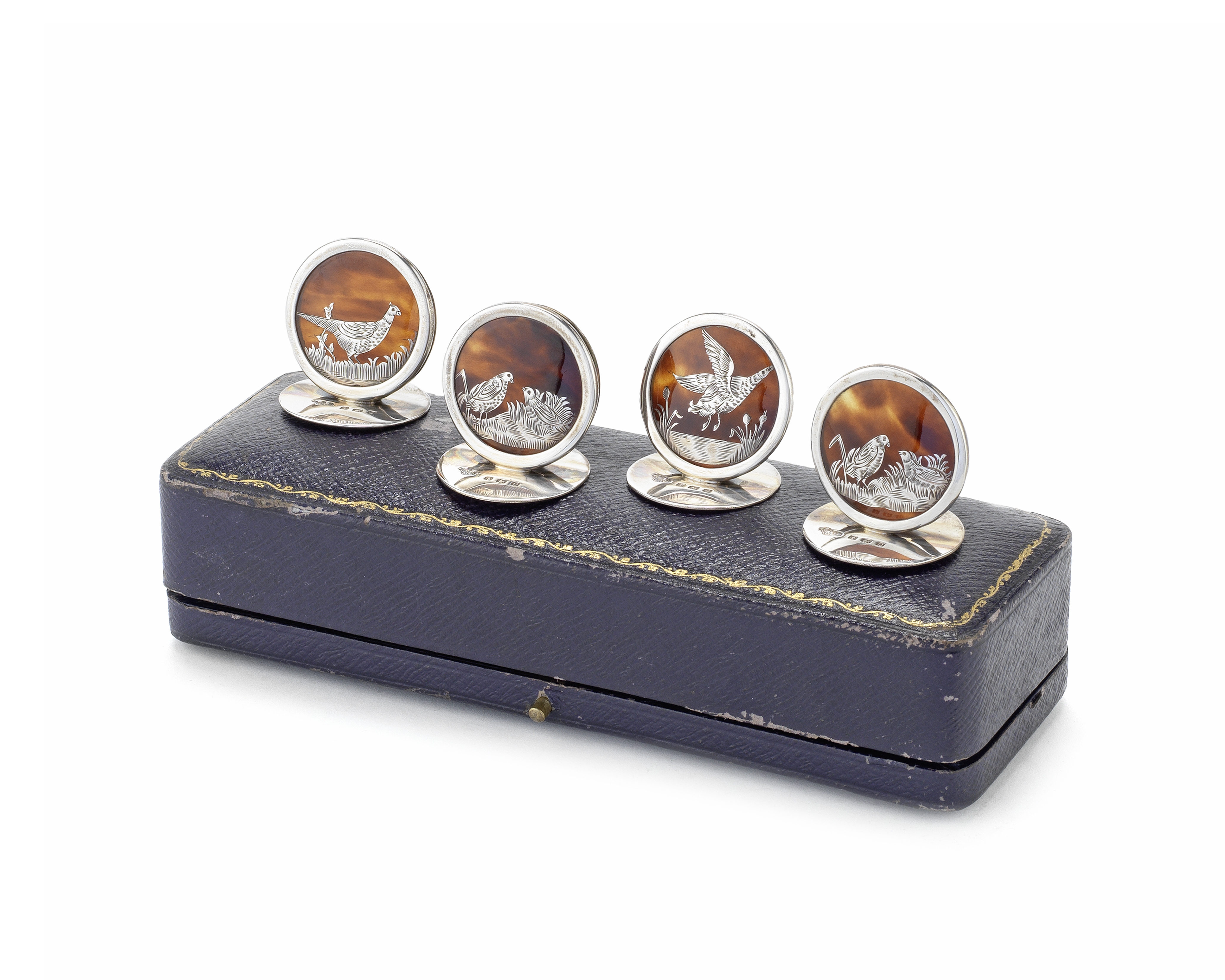 A set of four silver and tortoiseshell menu holders Goldsmiths & Silversmiths Company, Birmingham...