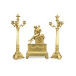 An early 19th century French matched gilt bronze figural clock garniture (3)