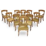 A set of twelve mid Victorian gothic revival oak dining chairs possibly by E.W. Pugin (12)