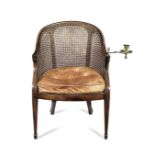 A late George III mahogany and brass mounted reading bergere