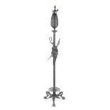 A late 19th patinated bronze floor standing lamp standard in the neo-grec style