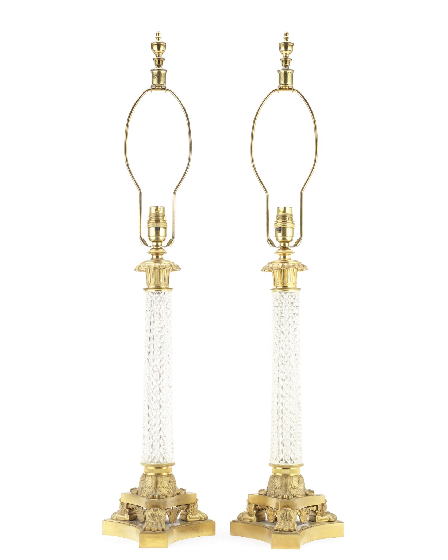 A pair of Empire style gilt bronze mounted cut glass lamp bases