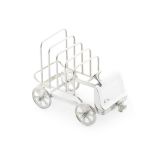 A novelty silver-plated toast rack marked 'Van Bergh'