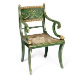 A Regency green painted and parcel gilt open armchair in the manner of George Smith