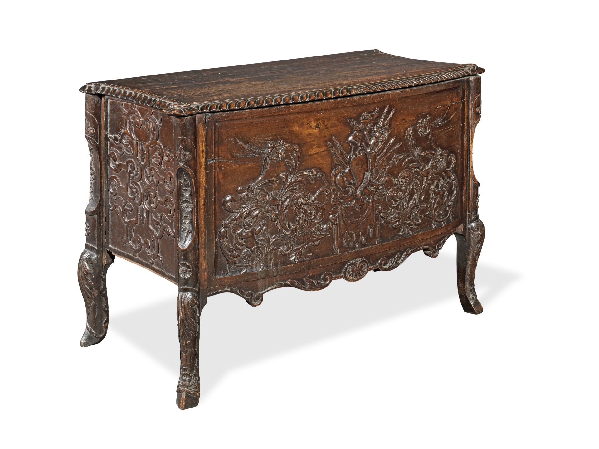 A French carved stained beech bowfront 'trousseau' coffer probably 19th century