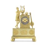 An early 19th century French gilt bronze figural mantel clock of small size the dial signed, Basi...