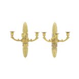 A pair of French Restauration gilt bronze three light wall appliques (2)