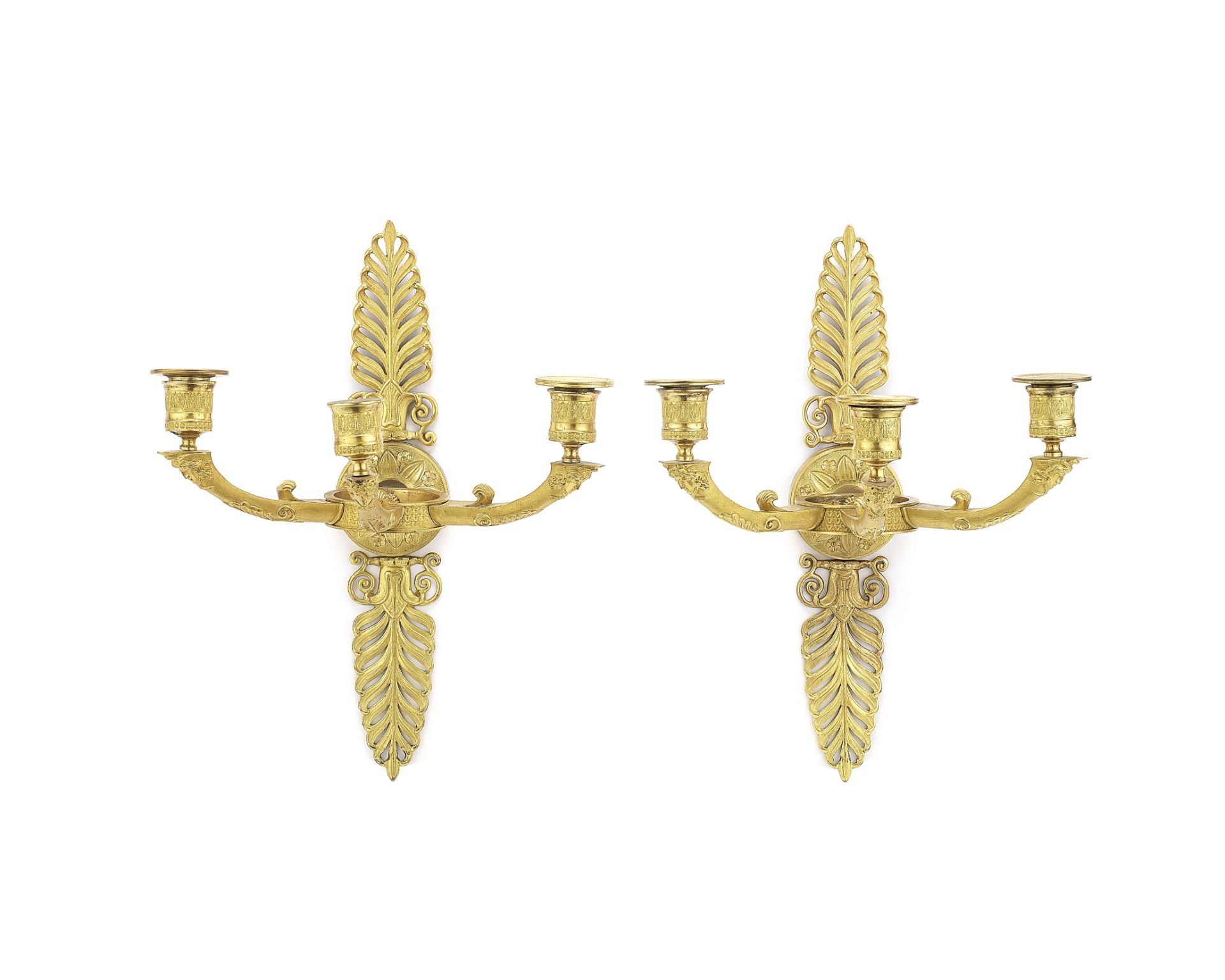 A pair of French Restauration gilt bronze three light wall appliques (2)