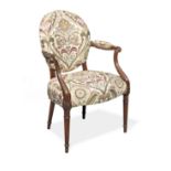 A George III mahogany open armchair in the manner of B. Harmer