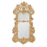 A large 19th century 'Rococo revival' carved giltwood and gilt composition pier mirror after Matt...