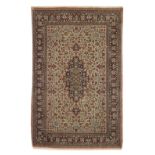 A Ghom ivory ground silk rug Central Persia, 164cm x 108cm