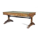 A Regency rosewood and brass inlaid library table attributed to Gillows