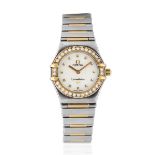 Omega. A lady's stainless steel and gold diamond set bracelet watch with mother of pearl dial Co...