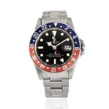 Rolex. A stainless steel automatic calendar bracelet watch with dual time zone GMT Master 'Pepsi...