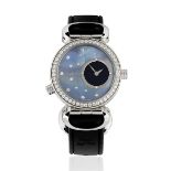 Korloff. A lady's stainless steel and diamond set quartz reversible wristwatch with dual mother o...