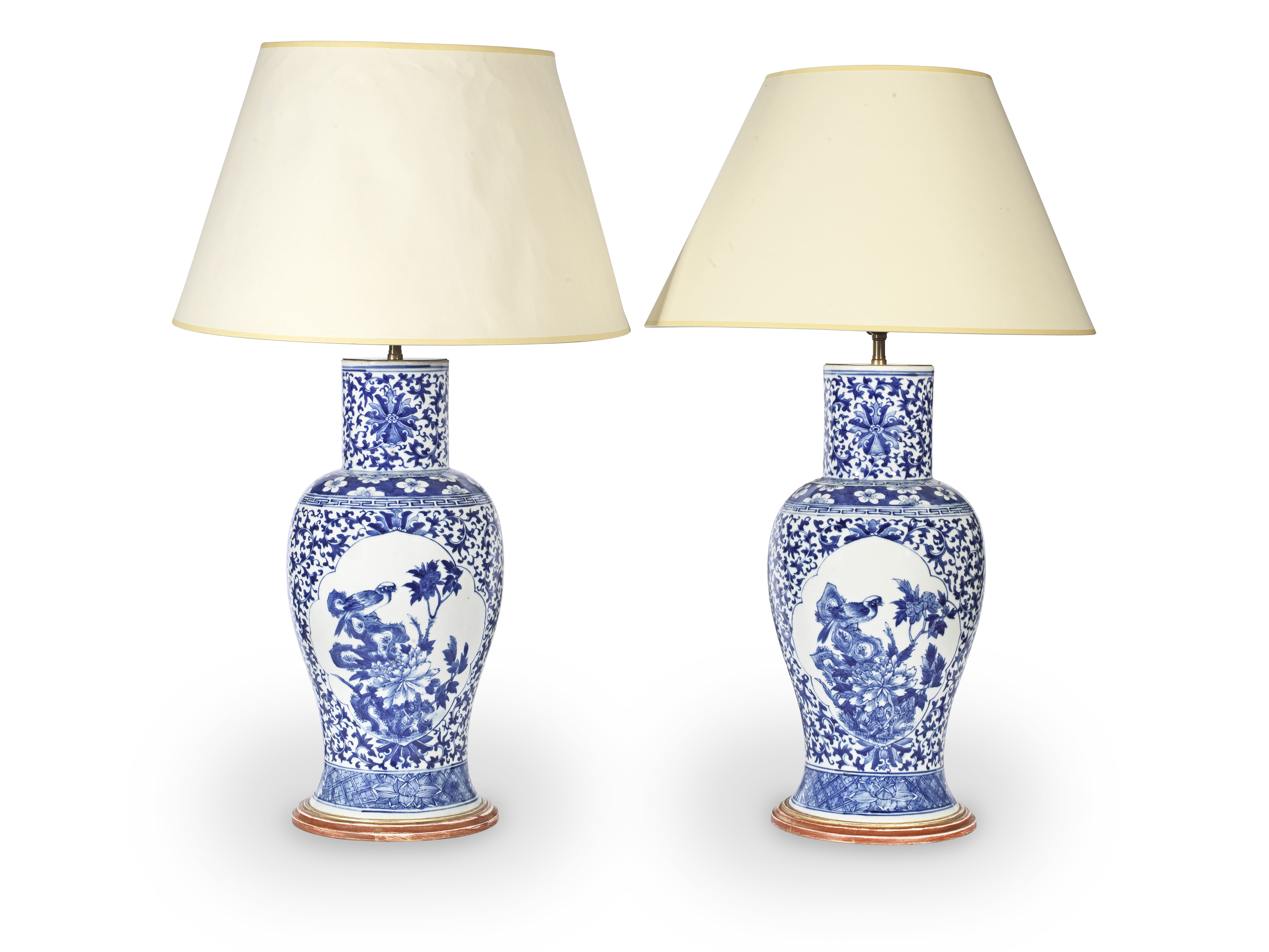 A pair of late 19th / early 20th century Chinese blue and white porcelain vases adapted as lamp b...