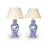 A pair of late 19th / early 20th century Chinese blue and white porcelain vases adapted as lamp b...
