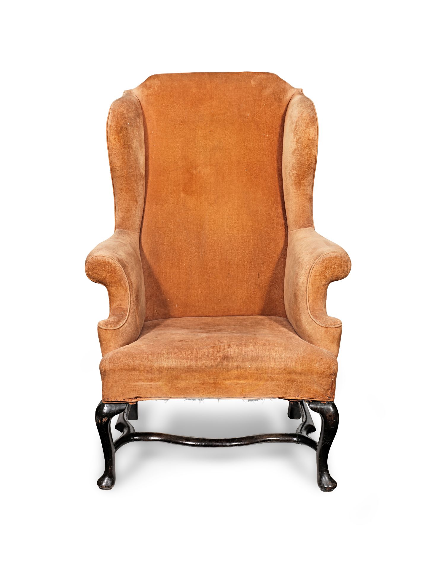 A George I walnut wing armchair