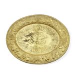 A 19th century Dutch gilt brass oval repouss&#233; charger in the 17th century taste, together w...