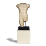 A late 20th century resin simulated marble torso of Apollo after the antique, cast by the Atelie...