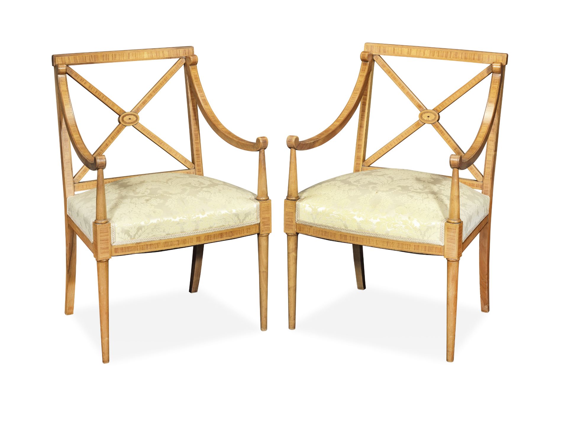 A pair of Edwardian 'Sheraton revival' walnut and inlaid open armchairs (2)