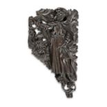 A 17th century carved walnut spandrel depicting St. Jerome and the Lion