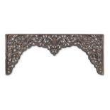 A 19th century carved and pierced eastern hardwood arch possibly Indian or Sri Lankan