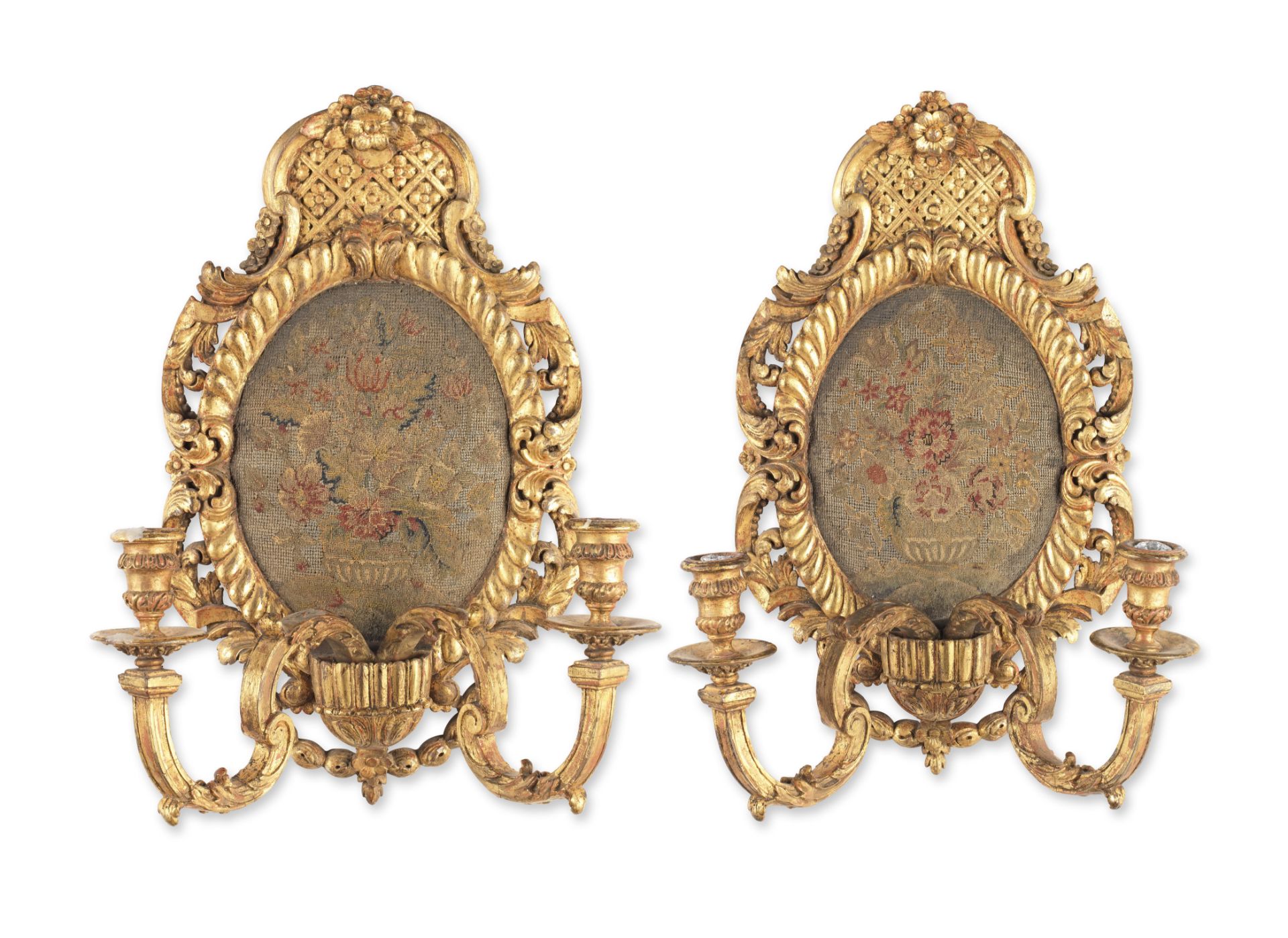 A pair of 19th century carved wood and gilt gesso composition twin wall light appliques in the L...