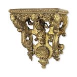 A large 19th century carved wood and gilt gesso and composition wall bracket in the R&#233;gence ...