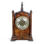 A mid 19th century mahogany bracket clock in the Gothic style the dial signed J. Hutton, London