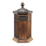 An oak 'Country House' type domestic post box in the Victorian style and made from earlier compon...