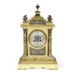 A late 19th century French patinated, silvered and gilt brass mantel clock