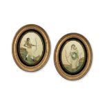 A pair of George III silk work embroidered oval pictures of boy and girl archers circa 1795-1800 ...