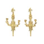 A pair of late 19th century French gilt bronze twin light wall appliques in the Louis XVI style