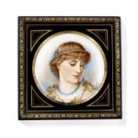 A late 19th century framed porcelain plate in the aesthetic taste,