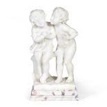 An early 20th century Italian carved alabaster figural group of two playful children