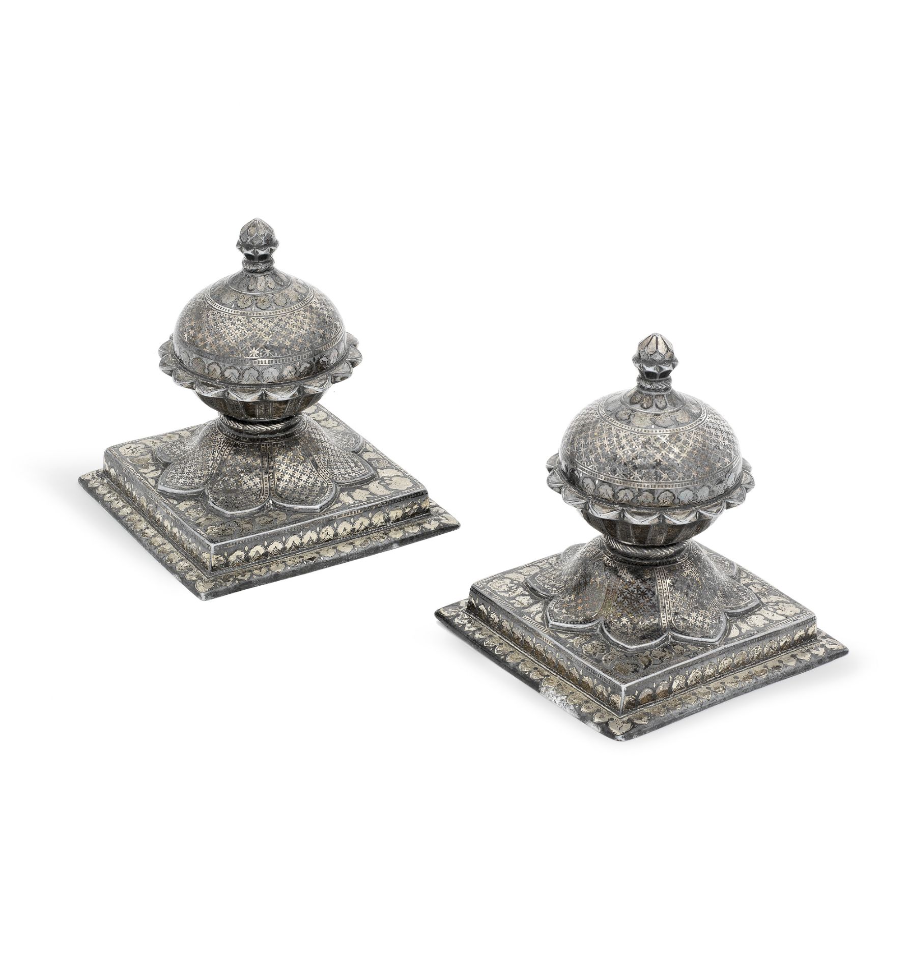 A pair of silver-inlaid alloy bidri carpet weights Deccan, 19th Century(2)