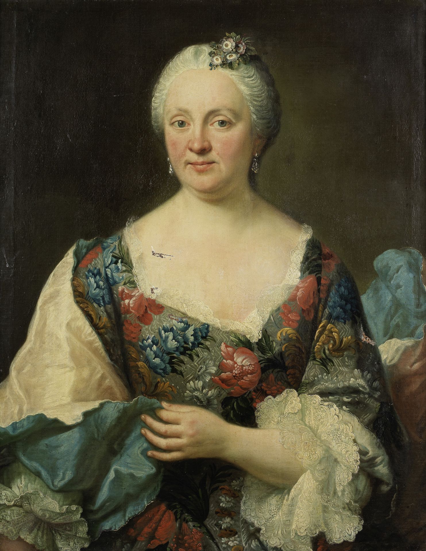 French School, mid 18th Century Portrait of a lady, half-length, in a flowered dress