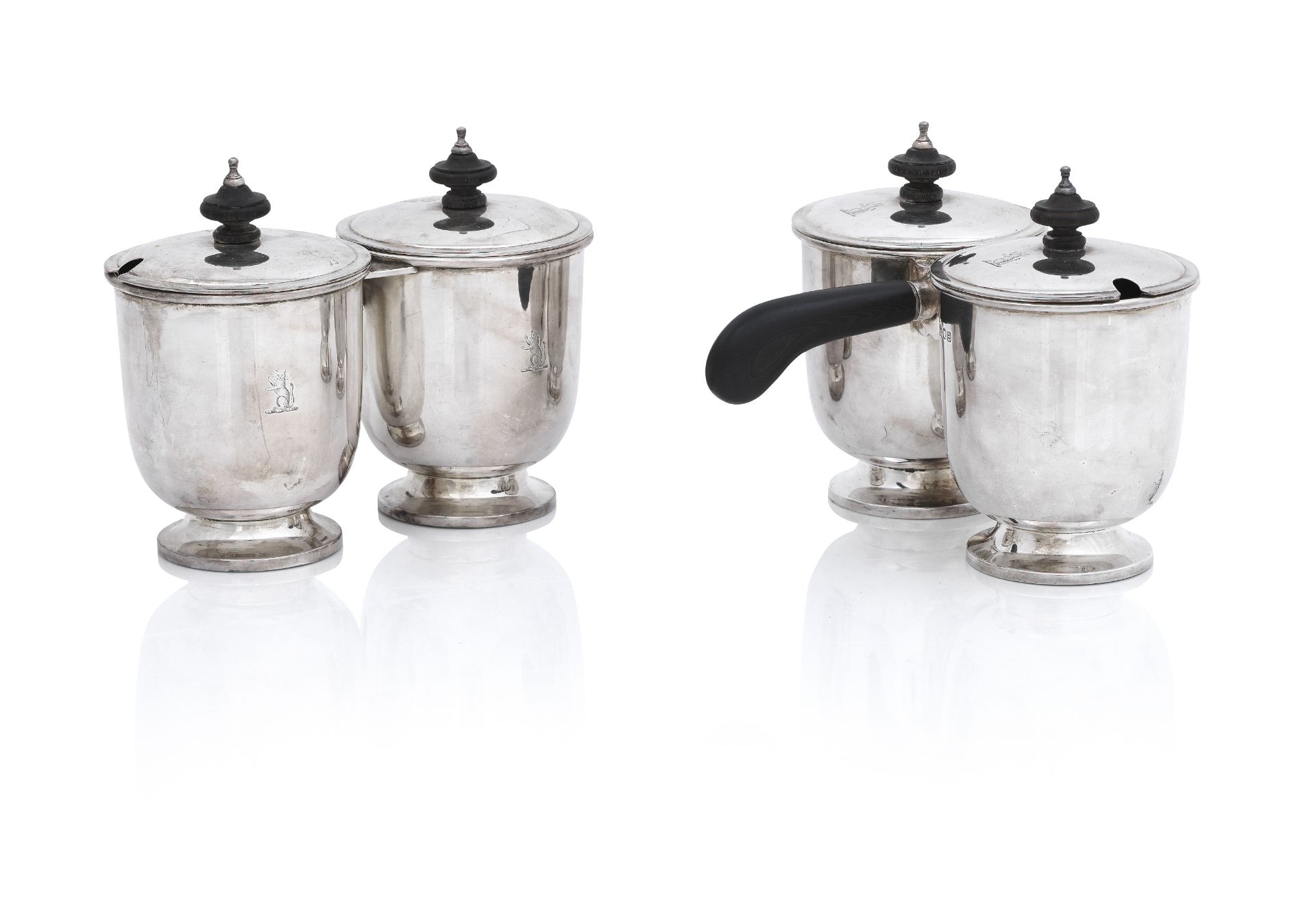 A pair of George VI silver double sauce containers and covers by C.J.Vander, London 1937