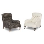 A near pair of early 20th century easy armchairs In the manner of Howard & Sons (2)