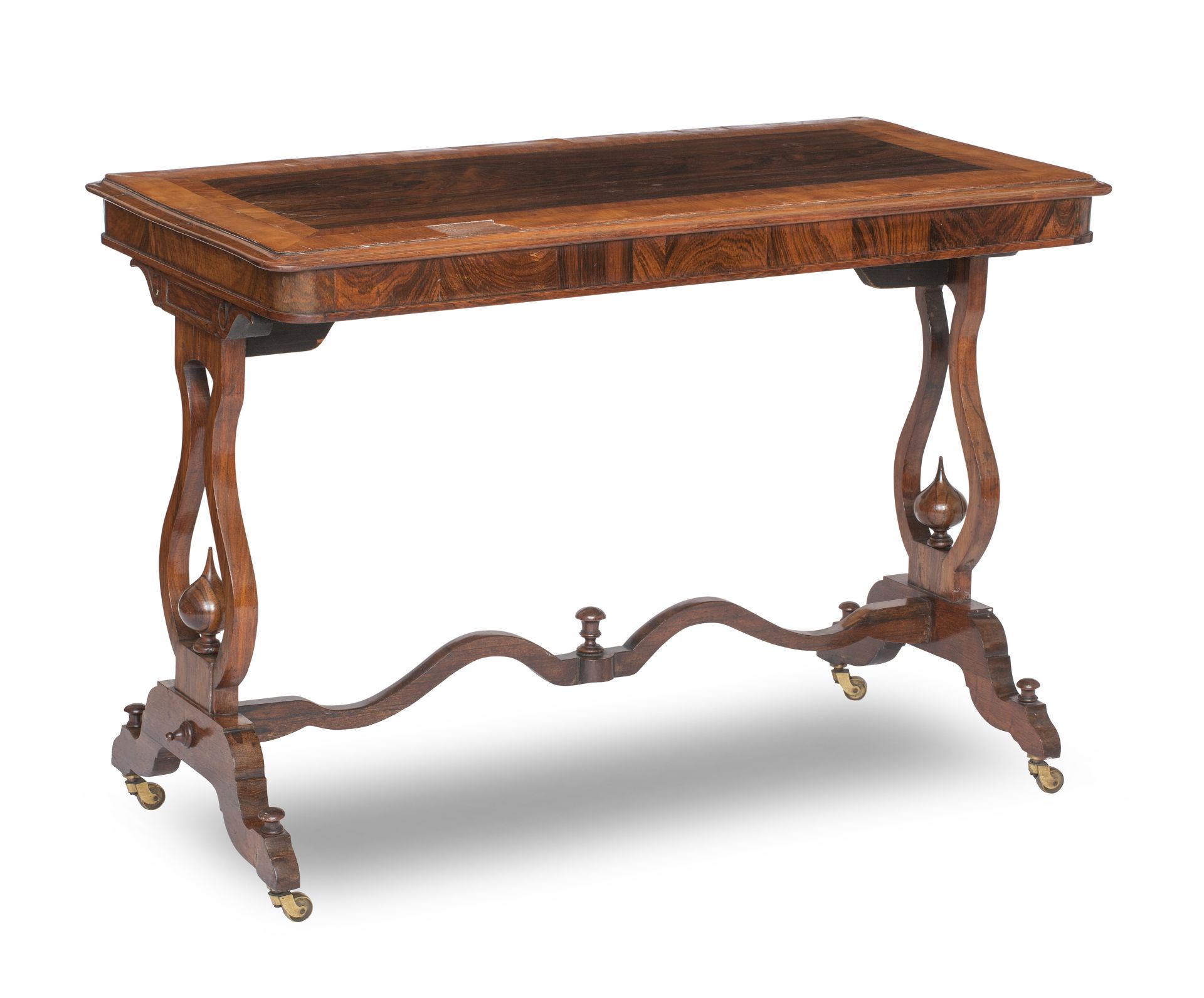 A late Regency satinwood and rosewood library table