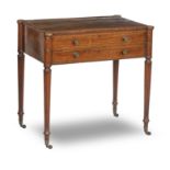 A Regency rosewood and brass inlaid writing table In the manner of Gillows