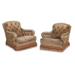 A near pair of late 19th century easy armchairs In the manner of Howard & Sons (2)