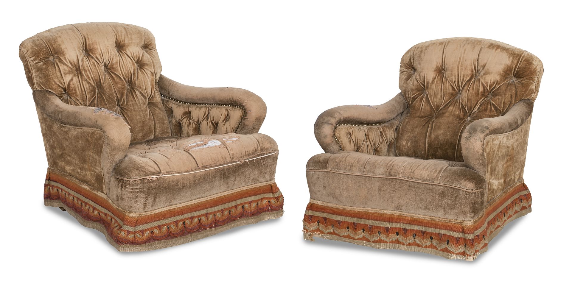 A near pair of late 19th century easy armchairs In the manner of Howard & Sons (2)