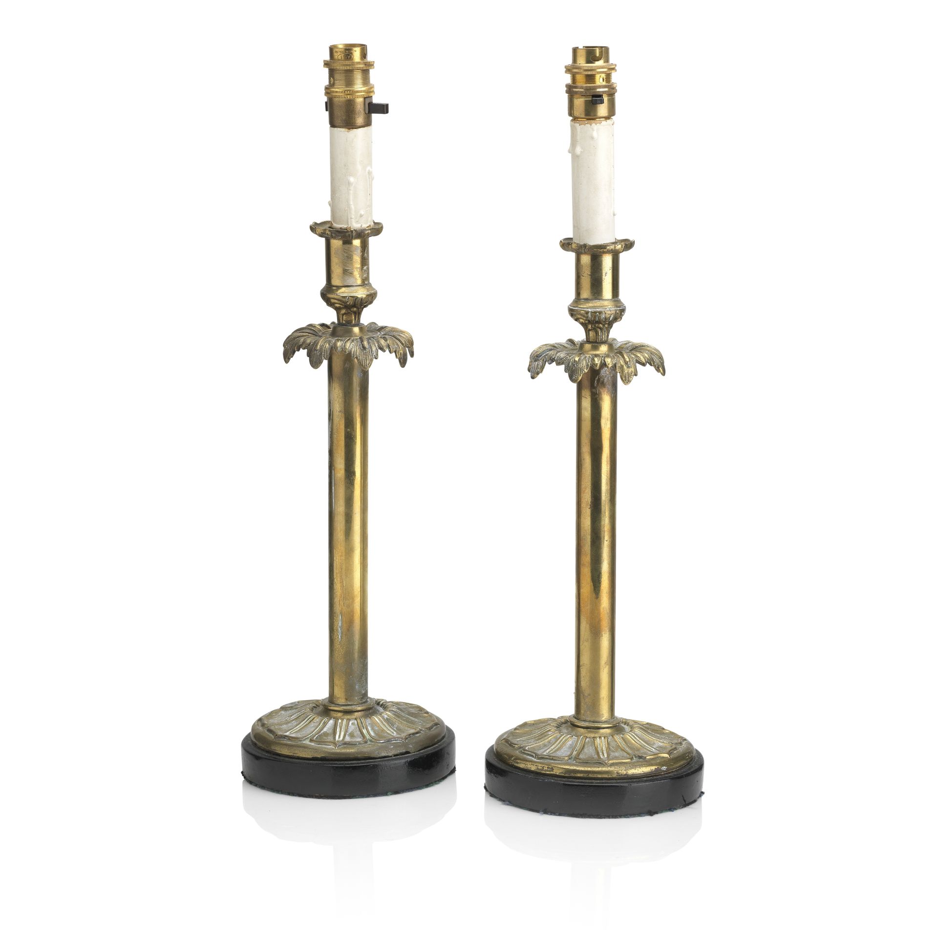 A pair of George IV ormolu candlesticks (2)