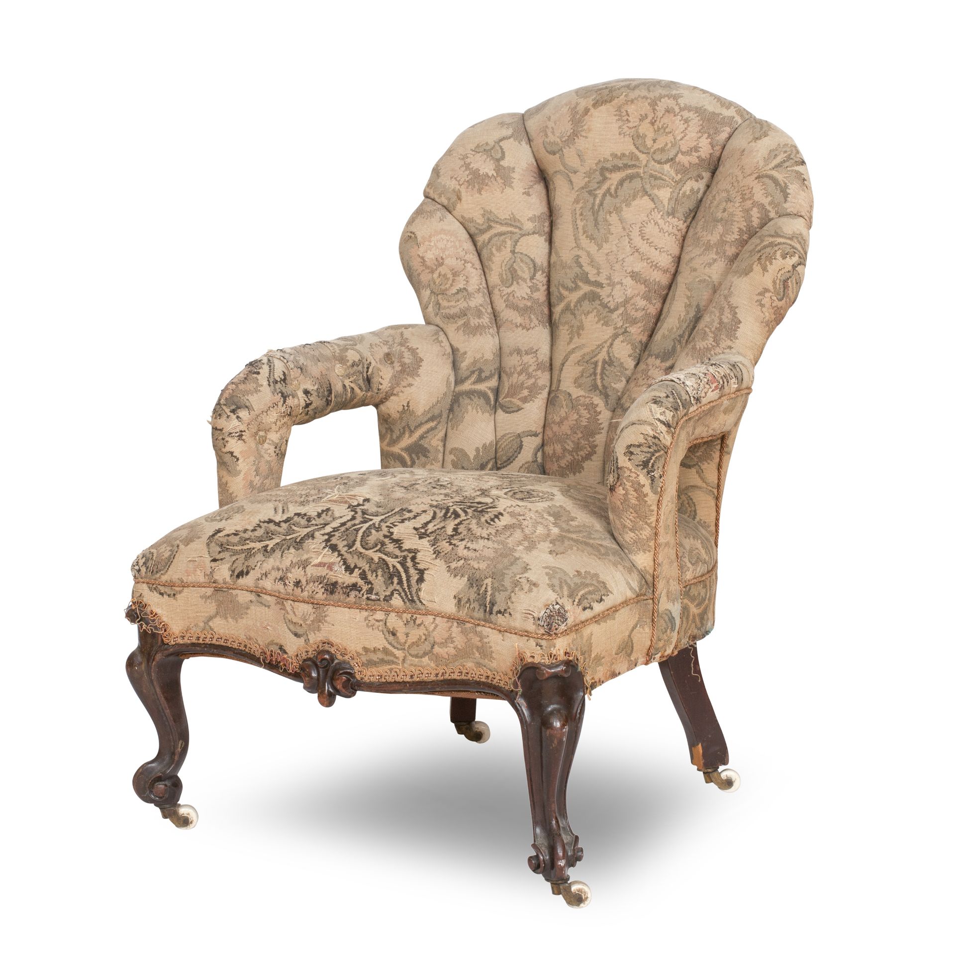 A Victorian mahogany and 'scallop shell' back armchair