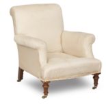 A first half 20th century upholstered easy armchair