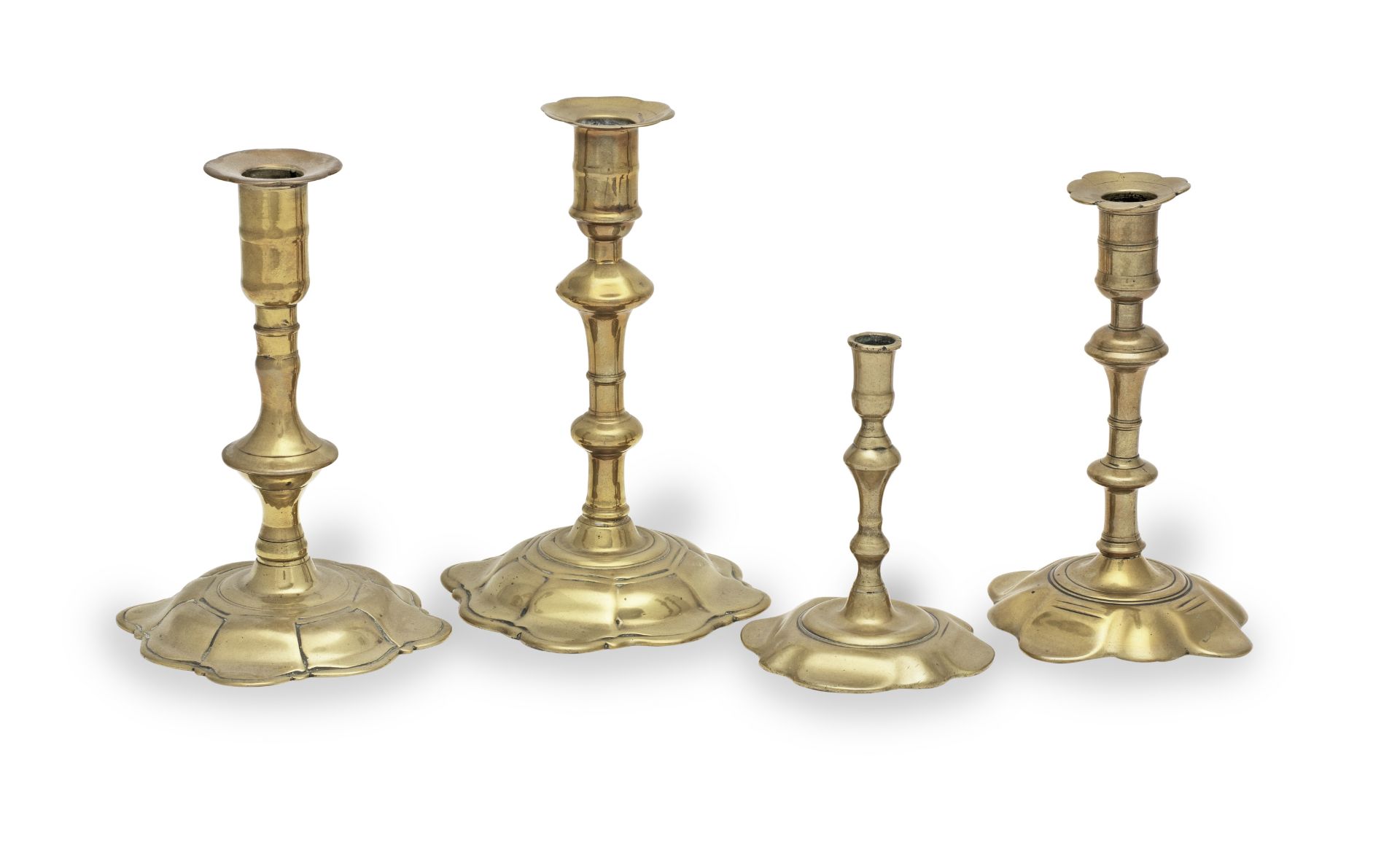 Three George II/George III brass alloy socket candlesticks, circa 1745-65 (4)