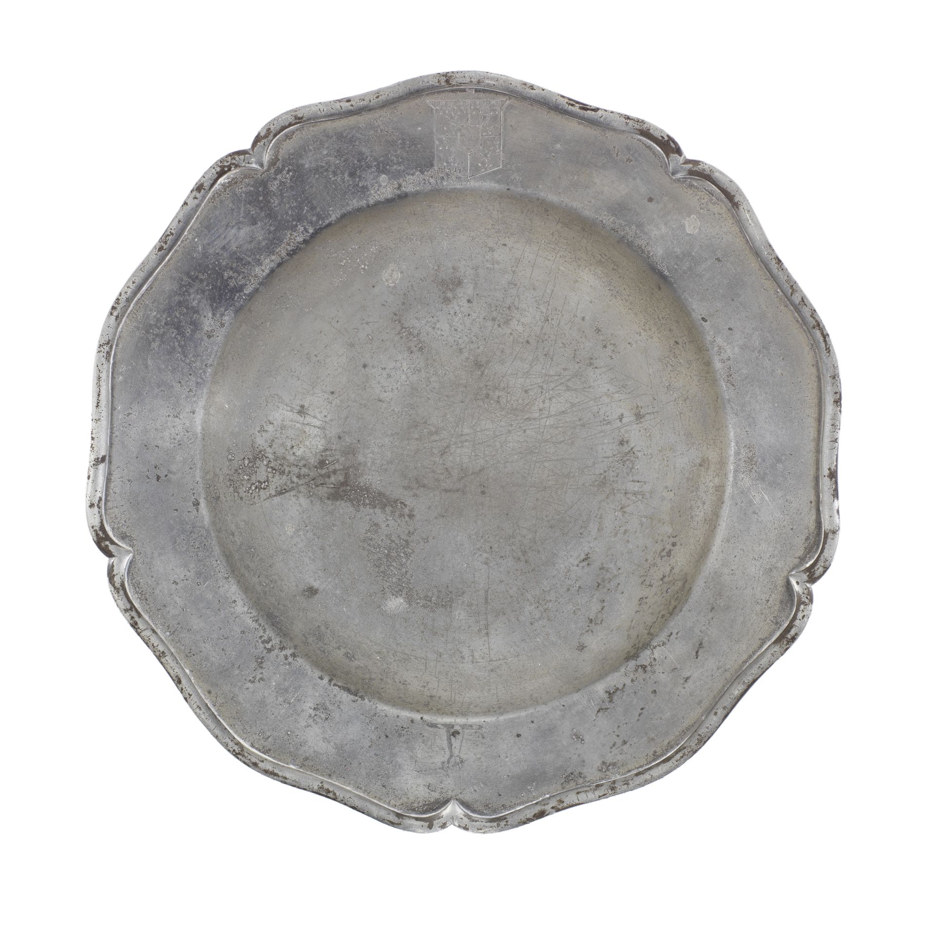 A George III pewter five lobed wavy-edged plate, circa 1800